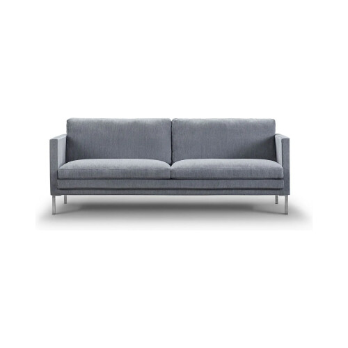 En dansk soffa från Juul furniture i grått tyg.