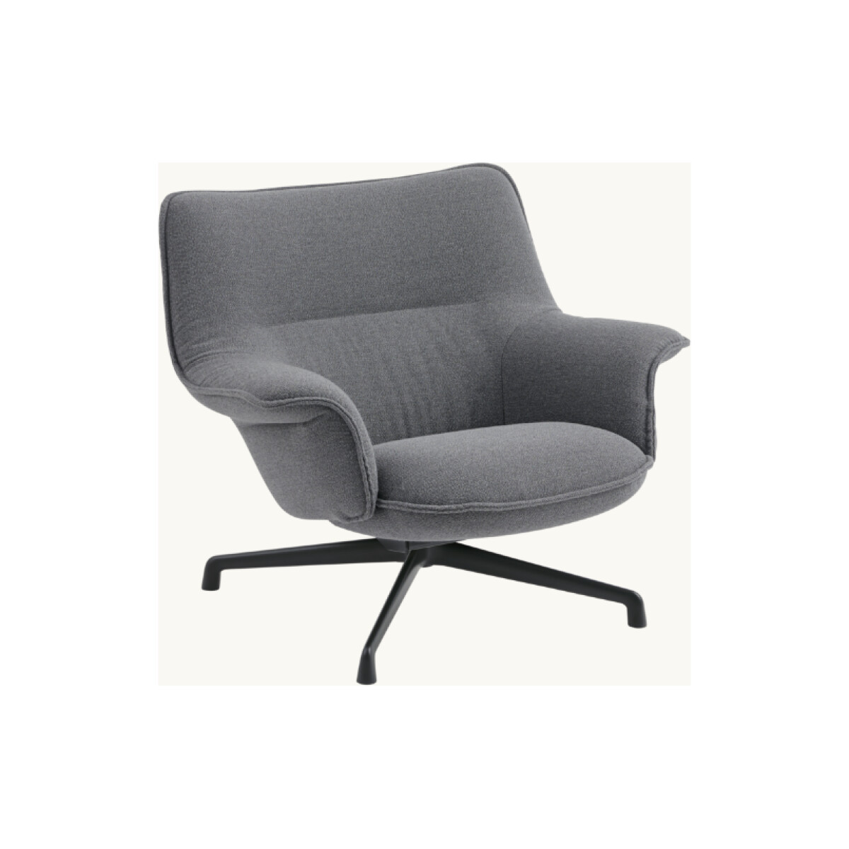 Muuto Doze Lounge Chair Low är tillverkad av en stomme i stål eller aluminium och stoppning i skum och vadd.